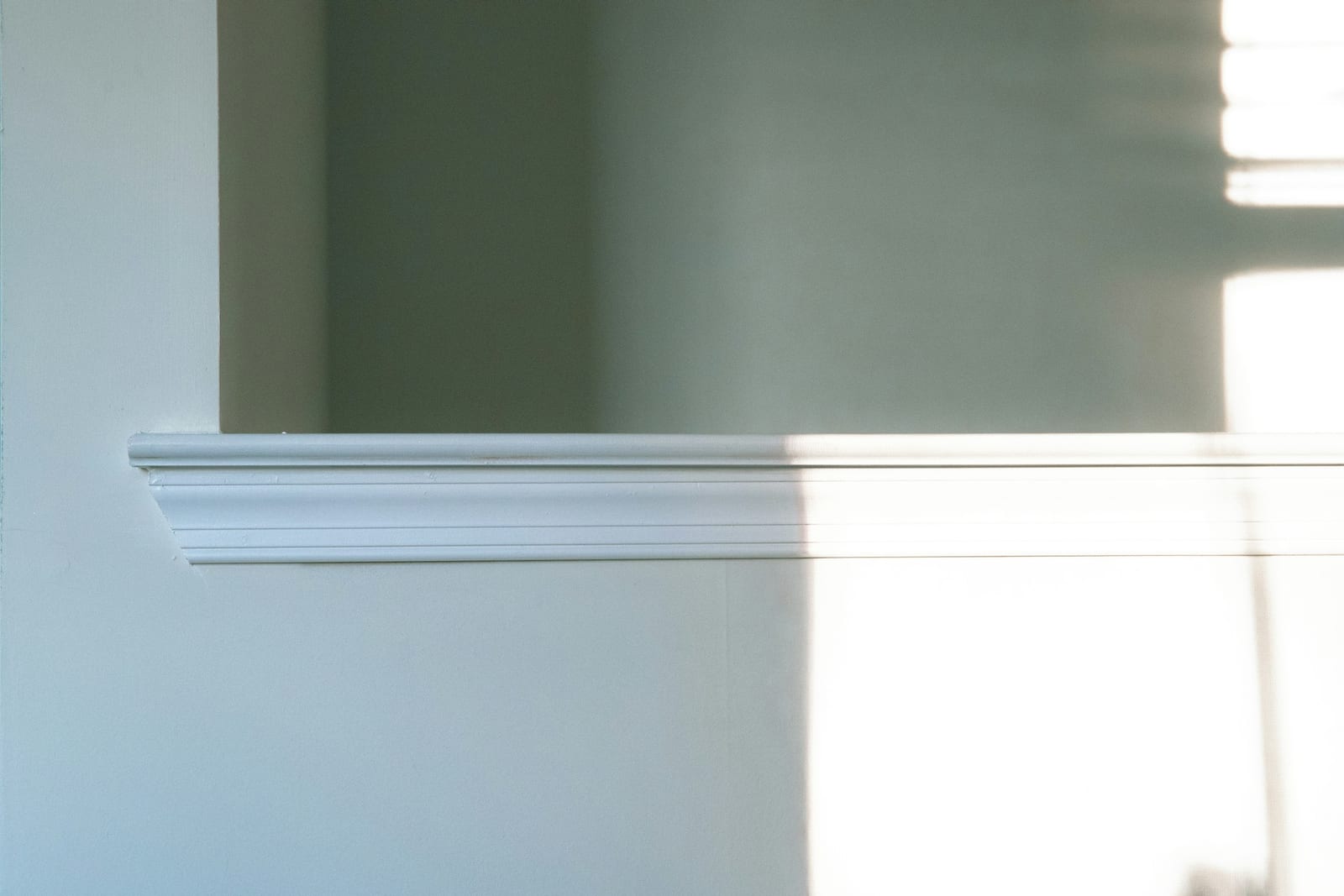 Crisp white trim and molding painted in a Garland, TX home.